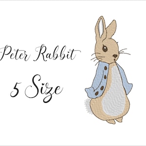 May include: Embroidered design of Peter Rabbit wearing a blue jacket. The text "Peter Rabbit" and "5 Size" is also included in the design.