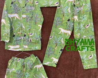 May include: A green pajama set with a jungle-themed print featuring leopards, zebras, birds, and tropical plants. The set includes a button-down shirt, shorts, pants, and a matching pouch. White trim outlines the edges of the garments.