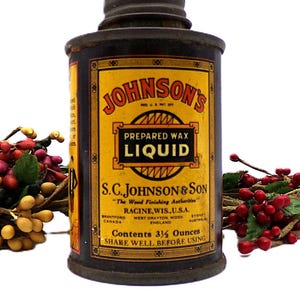 May include: Vintage Johnson's Prepared Wax Liquid can with a black and yellow label. The label includes the text "S.C. Johnson & Son" and "Contents 3 1/2 Ounces". The can is surrounded by red and yellow berries.