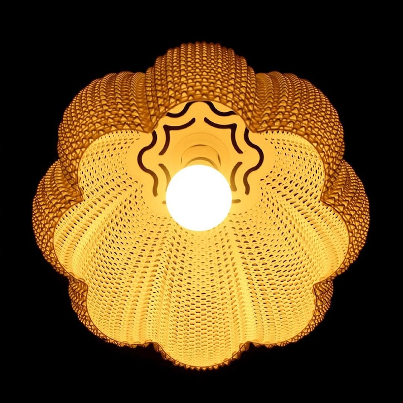 Bottom-up view of the lampshade with the light on (shown in Cotton colour).