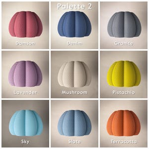 Alternative colour options of the lampshade, including: Damson (Muted Deep Purple/Pink), Denim (Dark Blue), Granite (Dark Grey), Lavender (Muted Purple), Mushroom (Off-White), Pistachio (Light Green / Dirty Yellow), Sky (Light Blue), Slate (Muted Blue/Grey), Terracotta (Deep Orange/Brown)