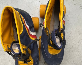 Seventies 70s roller skates roller skates boogie woogie disco skate in blue with striping yellow red white with metal frame collector item rare.