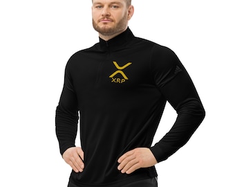 May include: Black long-sleeved shirt with a gold XRP logo on the front. The shirt has a zip at the neck and a small Adidas logo on the sleeve.