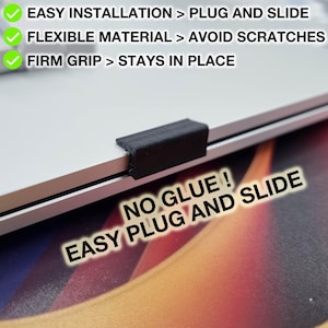 May include: A black, rectangular laptop webcam cover is shown installed on a silver laptop. The image includes text that reads "EASY INSTALLATION > PLUG AND SLIDE", "FLEXIBLE MATERIAL > AVOID SCRATCHES", and "FIRM GRIP > STAYS IN PLACE". The text "NO GLUE! EASY PLUG AND SLIDE" is also visible.