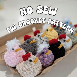 May include: A collection of colorful, crocheted chicken figures in an egg carton. The chickens are various colors, including pink, yellow, gray, and black, with red combs and yellow beaks. The text "NO SEW PDF CROCHET PATTERN" is displayed above the chickens.