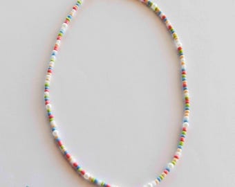 Kusthalsband, havshalsband, kokosnötsflickahalsband, surfarflickahalsband, flerfärgat