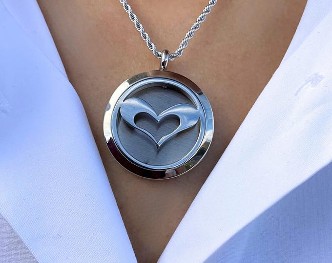 Featured listing image: Stainless Steel Heart Locket Necklace – Hypoallergenic, Non-Tarnish Jewelry for Everyday Wear and Work.