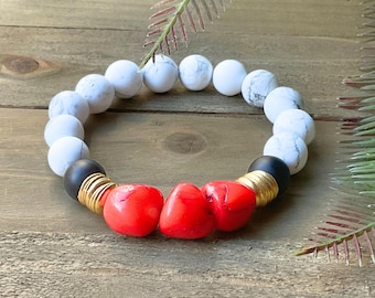 Handcrafted Red Coral Bracelet with Brass, Black Onyx, and Howlite - Durable 10mm Elastic Band.