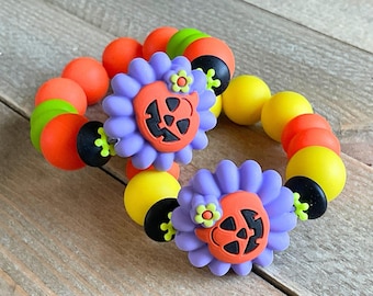 Halloween Silicone Bead Bracelet for Kids & Adults – Cute Pumpkin Face in Purple Flower, Fall Colors Available.