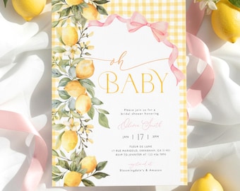 May include: A baby shower invitation with a lemon theme. The invitation features the words "oh BABY" in gold script, with a yellow gingham border and a pink ribbon. Lemons and floral accents decorate the invitation.