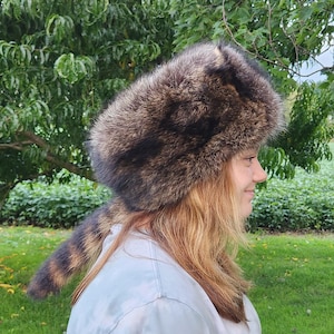 100% real raccoon fur hat, fur inside and out.