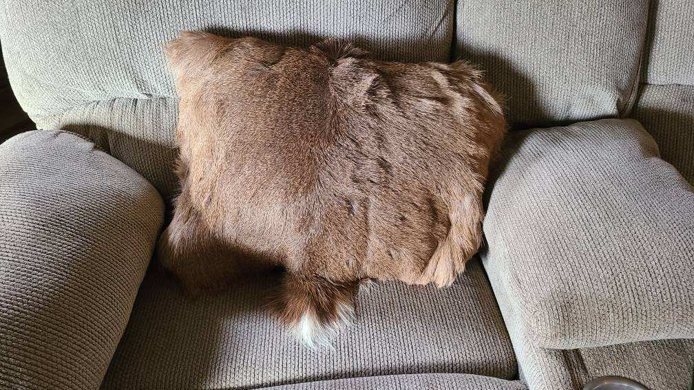 Rectangular furry real deer hide throw pillow