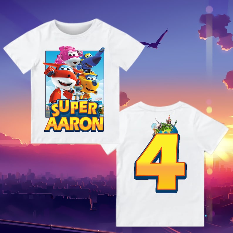 May include: White t-shirt with a colorful cartoon image of a plane and other characters. The text 'SUPER AARON' is printed below the image. The back of the shirt has a large yellow number 4 with a globe image inside the number.