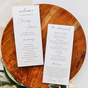 May include: A wedding ceremony program with a white background and black text. The program lists the order of events for the wedding ceremony of Chrissy and James, which will take place on October 12, 20XX in San Diego, California. The program also includes a list of the wedding party members.