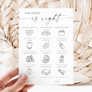 Puede incluir: Una tarjeta blanca con el texto "THE PRICE is right" e ilustraciones de artículos para bebés como pañales, un body y un biberón. La tarjeta se sostiene frente a un fondo beige tejido.