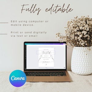 May include: A laptop computer screen displaying a printable sign that says "Let's Get Toasted" with a graphic of two marshmallows on sticks and the text "Roast a Marshmallow and Party S'more". The sign is on a white background. The laptop is on a white surface with a white vase with dried flowers.