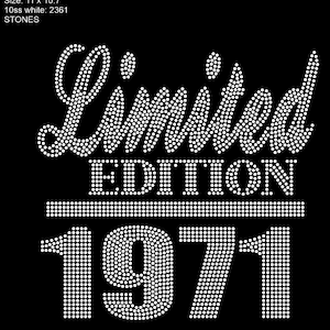 May include: White rhinestone design on a black background that says "Limited Edition 1971".