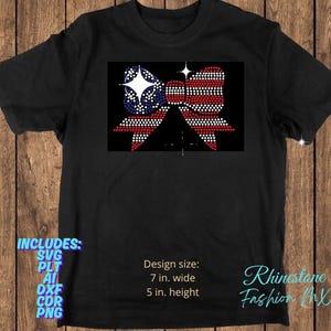 May include: Black t-shirt with a rhinestone bow design in red, white, and blue, reminiscent of the American flag. The design measures approximately 17.8 cm wide and 12.7 cm high. Includes SVG, PLT, AI, DXF, CDR, and PNG files.