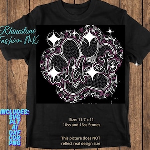May include: Black t-shirt featuring a rhinestone paw print design. The design includes the word "Wildcats" in a cursive font, surrounded by white, pink, and grey rhinestones. The shirt includes the text "Rhinestone Fashion MX" and "INCLUDES: SVG PLT AI DXF CDR PNG".