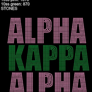 May include: A pink and green rhinestone design that reads "ALPHA KAPPA ALPHA".