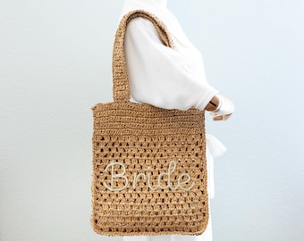 Strogeweven draagtas: boho-chique strandschoudertas