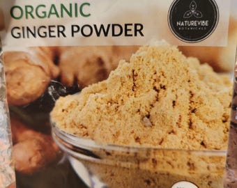 May include: A package of organic ginger powder. The package has the words "ORGANIC GINGER POWDER" in large green letters. The net weight is 80 oz (5 lbs). The package also has the words "ORGANIC RAW SUPERFOOD".