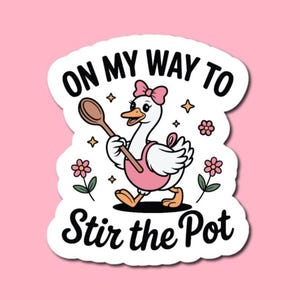 May include: A sticker featuring a cartoon goose wearing a pink apron and bow, holding a wooden spoon. The text "ON MY WAY TO Stir the Pot" is above and below the goose. The sticker is on a pink background.
