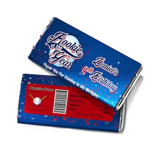 May include: Two blue chocolate bars with baseball designs. One bar says "Rookie of the Year" and "Daniel's 4th Birthday." The other has a nutrition facts label and baseball graphics. Both bars have red and white star accents.