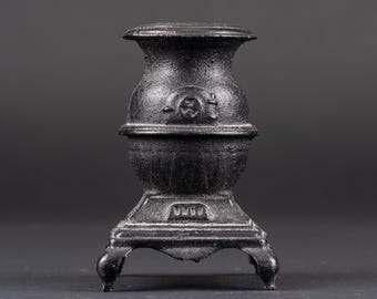 Vintage Cast Iron Stove Still Coin Bank from Canada Forge
