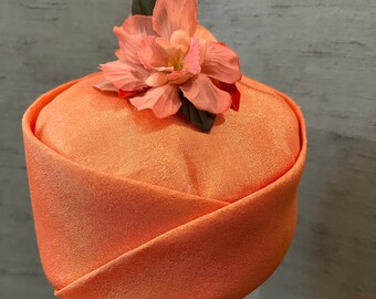 1960 orange Pillbox in linen with flowers on the crown