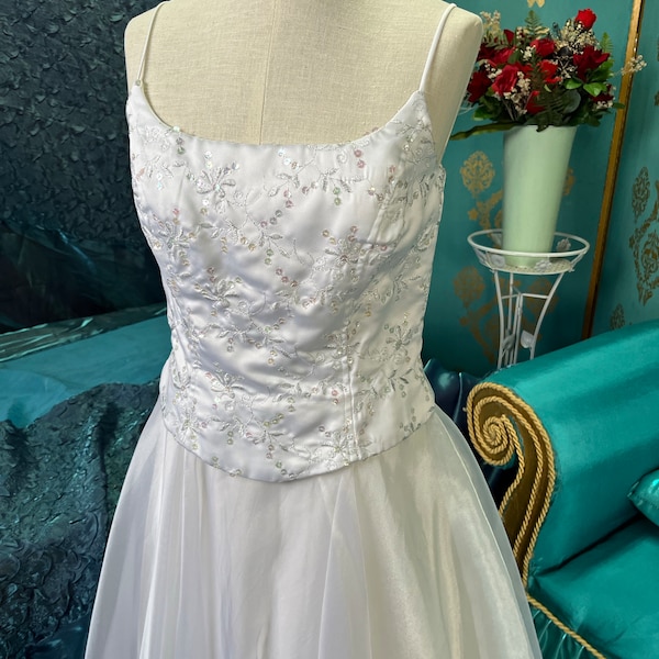 Brocade, sequined satin bodice, sheer, nylon chiffon flare skirt, wedding gown