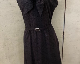 1960 blk cotton dress, eyelet like, circular pattern, rhinestone buckle