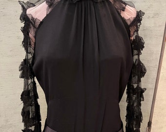 1930 evening gown, black silk crepe with ruffled tulle long sleeves, and a silk satin and rhinestone belt,