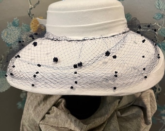 1970 linen,wide brim hat in white with navy netting