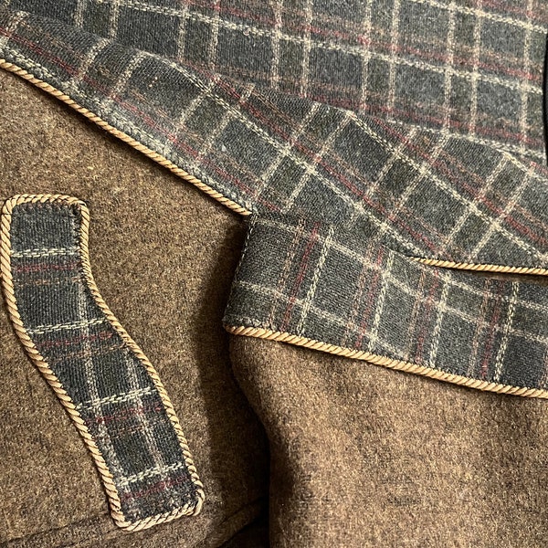 20’s  Browning King & Co. smoking jacket, moss colored wool, plaid lining and accents, trimmed in cording, frog closure