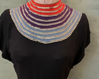30’s black wool and silk crepe gown with striped, multi colored yoke, silk string belt with matching colored decorations