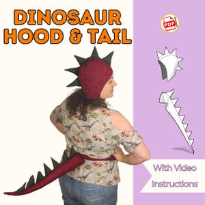 May include: A burgundy dinosaur hood and tail set with green accents. The hood has green spikes and the tail is attached with a belt. The image includes the text "DINOSAUR HOOD & TAIL" and "With Video Instructions".