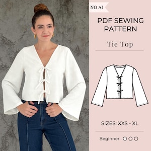 Könnte beinhalten: Ein weißes Langarm-Oberteil mit V-Ausschnitt und drei Bindebändern vorne, kombiniert mit einer dunkelblauen Jeans. Das Bild enthält den Text PDF SEWING PATTERN, Tie Top, SIZES: XXS - XL, Beginner sowie eine technische Skizze des Oberteils.