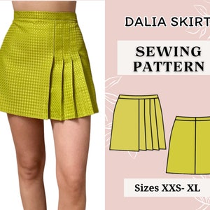 May include: A sewing pattern for a Dalia skirt in sizes XXS-XL. The pattern includes a diagram of the skirt with pleats and a solid skirt.