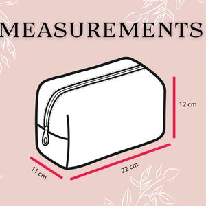 May include: A white zippered makeup bag with black trim. The bag measures 11 inches wide, 22 inches long, and 12 inches tall.