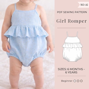 May include: A light blue baby romper with a ruffled top and spaghetti straps. The romper is made of a soft, textured fabric and has a comfortable fit. The image also includes the text "Girl Romper" and "SIZES: 6 MONTHS - 6 YEARS".