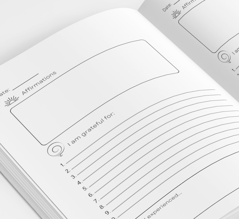 May include: A blank journal page with a lined section for writing down things you are grateful for. The page also has a section for writing affirmations. The journal has a simple design with a sun icon at the top of the page.