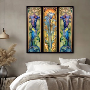 May include: A three-panel art print featuring a stained glass design of stylized flowers in shades of blue, green, and yellow. The artwork is framed in black and has a vintage aesthetic.