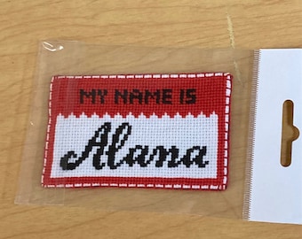 Custom cross-stitched nametag