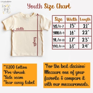 May include: Cream-colored youth t-shirt with a size chart. The chart shows sizes YS/6-7 with a 15-inch width and 21-inch length, up to YXL/12-14 with an 18-inch width and 24-inch length. Additional text includes "100% Cotton", "Pre-shrunk", and "Side seam".