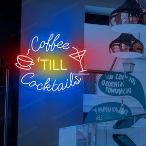 May include: Neon sign with a blue, red, and yellow gradient. The sign says "Coffee 'Till Cocktails" with a coffee cup and a martini glass icon.