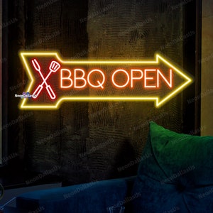 May include: A yellow neon sign with an arrow pointing to the right. The sign says "BBQ OPEN" in red neon letters. There are crossed red utensils in the corner of the sign.