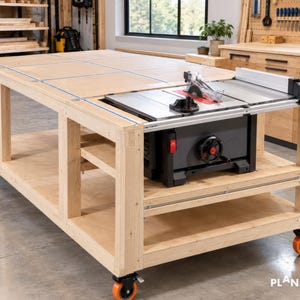 May include: A large, rectangular wooden workbench featuring a light-coloured plywood surface and a sturdy frame. A black and silver table saw is integrated into the top. The workbench is mounted on four bright orange swivel castors for mobility.