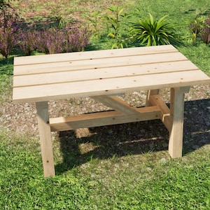 May include: A wooden table with a natural finish and a simple design. The table has a rectangular top and four legs. It is sitting on a grassy lawn.