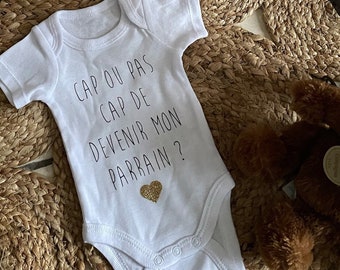 Personalized baby bodysuit asks godfather "capable or not capable of becoming my godfather?"